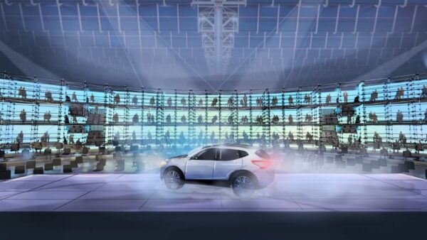 SCALA event in Jaarbeurs Utrecht met auto op het podium en wanden met loges waar mensen zitten